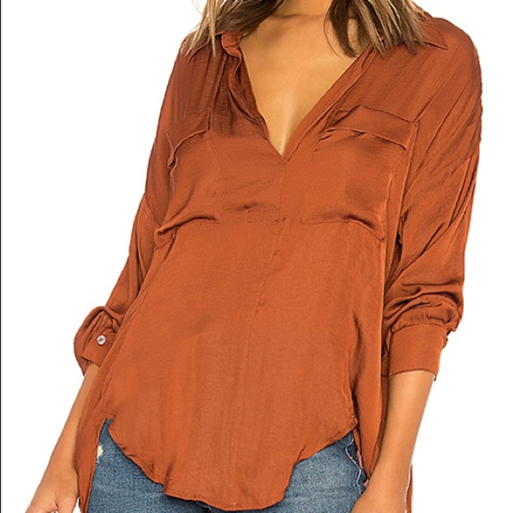 brown flowly and silky blouse